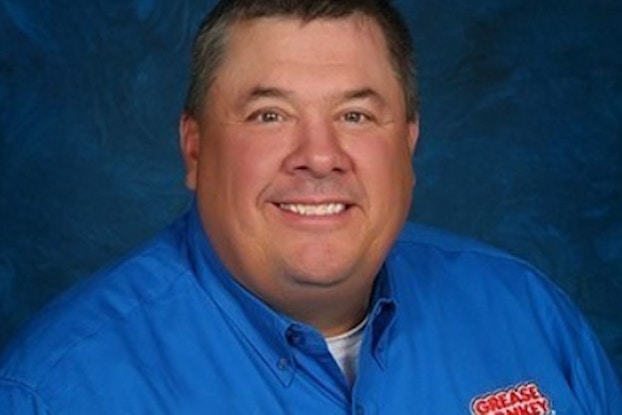 Headshot of Brian Michel, Vice President of Operations at Grease Monkey, an automotive maintenance franchise.