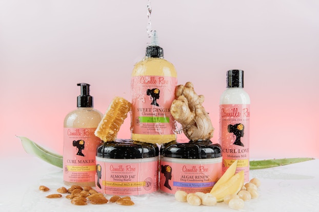 Image of the Camille Rose signature collection of hair care products.