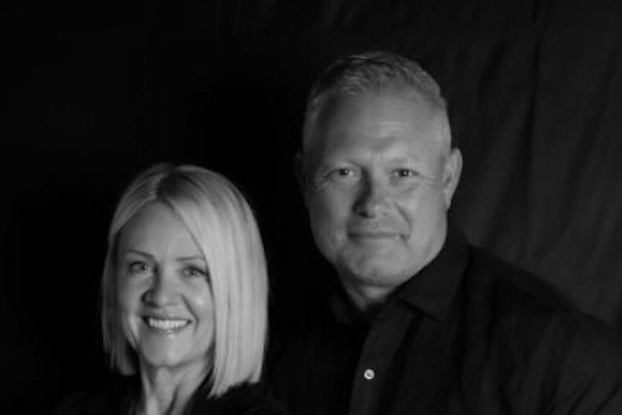 Headshot of Drs. Vanessa and Jason Helfrich, Co-Founders of 100% Chiropractic, a chiropractic health franchise.