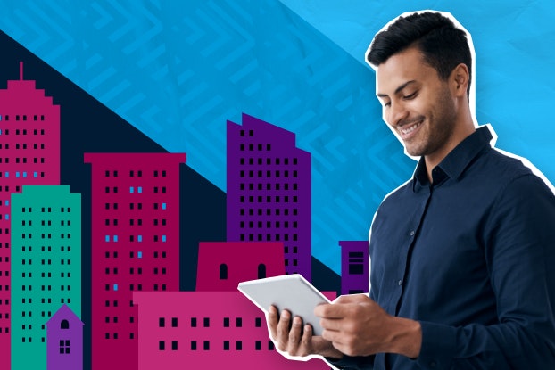 Person holding tablet with colorful cartoon-like images of buildings in the background.